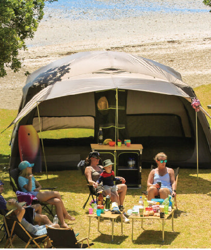 Family camping with a Zempire Air Frame tent. 